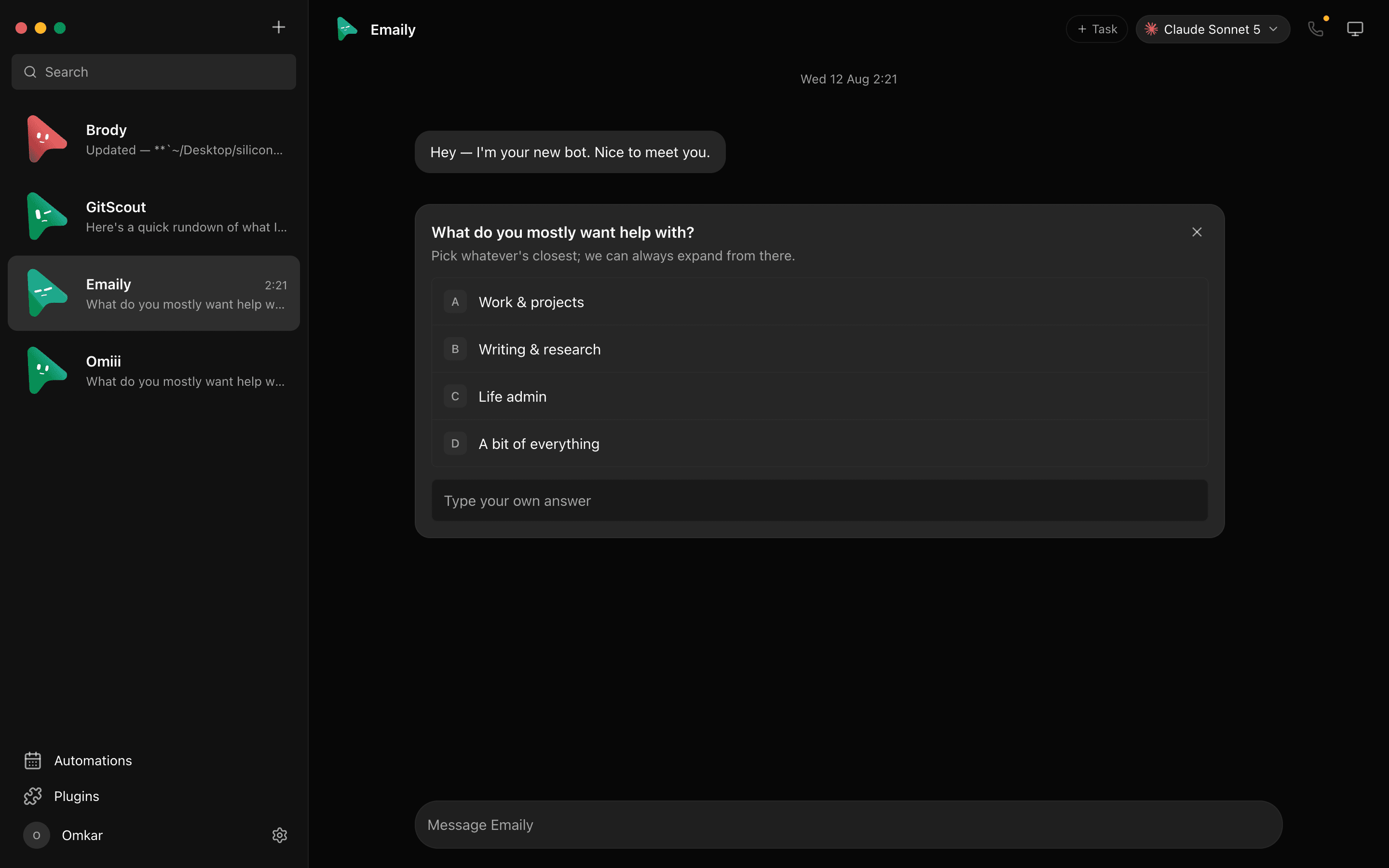 A question card in an OpenMausBot chat with lettered options and a free-text answer box